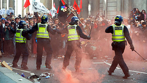 Police attempt to subdue the crowds near the Bank of England, during the G20 protests in the centre of London. PRESS ASSOCIATION Photo. Picture date: Wednesday April 1, 2009. See PA story POLITICS G20 Protest. Photo credit should read: Owen Humphreys/PA Wire